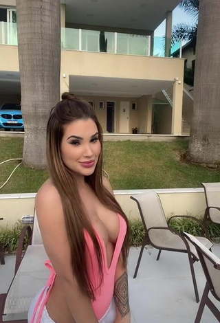 Hot Alannis Proença Shows Cleavage in Pink Swimsuit