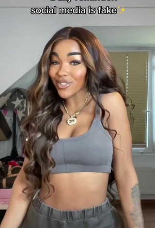 Sexy Alicia Awa Shows Cleavage in Grey Crop Top