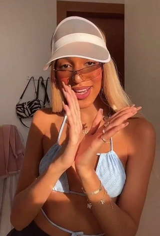 Cute Alisha Kone Shows Cleavage in Blue Bikini Top