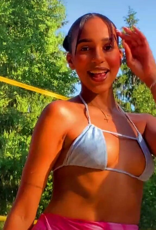 Sexy Alisha Kone Shows Cleavage in Blue Bikini Top