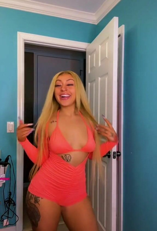 2. Hot Alli Haas Shows Cleavage in Orange Overall