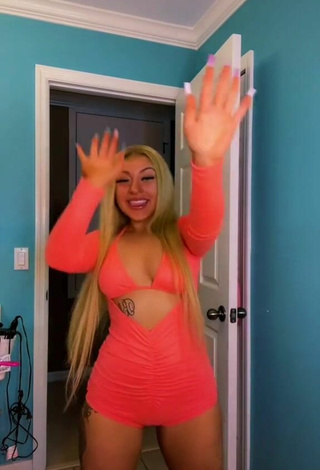 5. Hot Alli Haas Shows Cleavage in Orange Overall