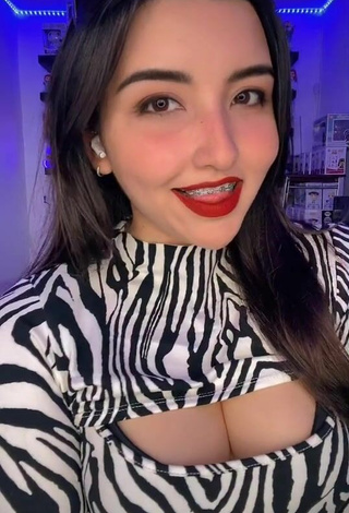 Hot Andyy Tok Shows Cleavage in Zebra Dress