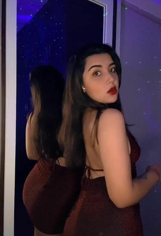 Sexy Andyy Tok Shows Cleavage in Dress