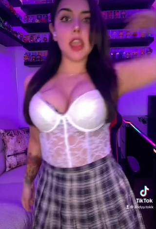 6. Sexy Andyy Tok Shows Cleavage in White Corset