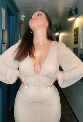 4. Beautiful Anissa Shows Cleavage in Sexy Dress