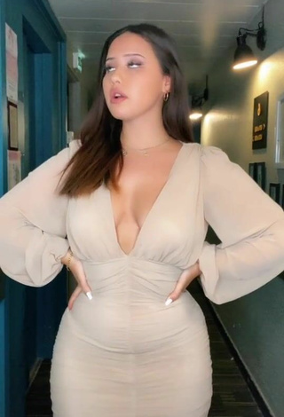 6. Beautiful Anissa Shows Cleavage in Sexy Dress
