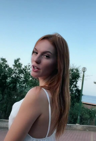 3. Sexy Anna Ciati Shows Cleavage in White Top