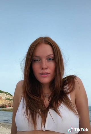 6. Sexy Anna Ciati Shows Cleavage in White Bikini Top