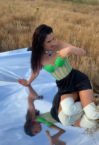 2. Sexy Anna Trincher Shows Cleavage in Green Corset