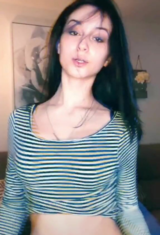 5. Beautiful Arianna Roman Shows Cleavage in Sexy Striped Crop Top