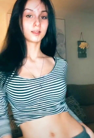 6. Beautiful Arianna Roman Shows Cleavage in Sexy Striped Crop Top