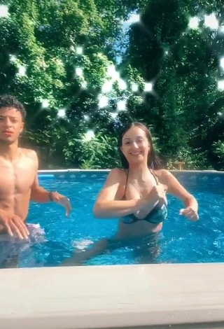 Hot Arianna Roman Shows Cleavage in Bikini Top at the Swimming Pool