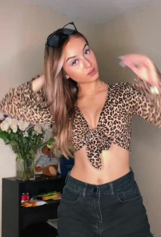 2. Cute Arianna Roman Shows Cleavage in Leopard Crop Top