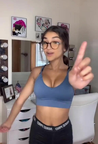 Sweet Ava Justin Shows Cleavage in Cute Sport Bra