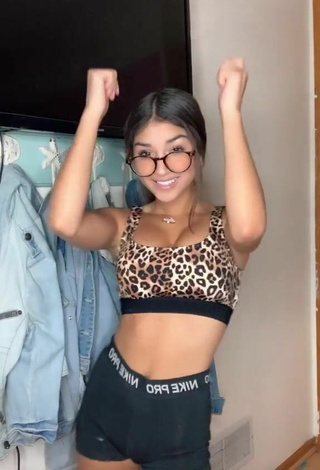 2. Beautiful Ava Justin Shows Cleavage in Sexy Leopard Sport Bra
