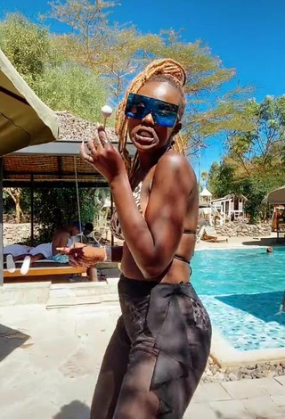 Hot Azziad Nasenya Shows Cleavage in Leopard Bikini Top