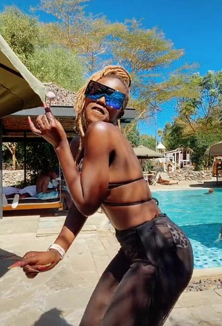 3. Hot Azziad Nasenya Shows Cleavage in Leopard Bikini Top
