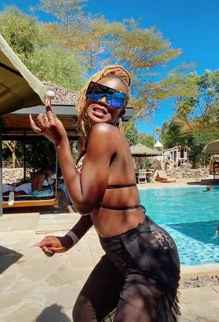 4. Hot Azziad Nasenya Shows Cleavage in Leopard Bikini Top