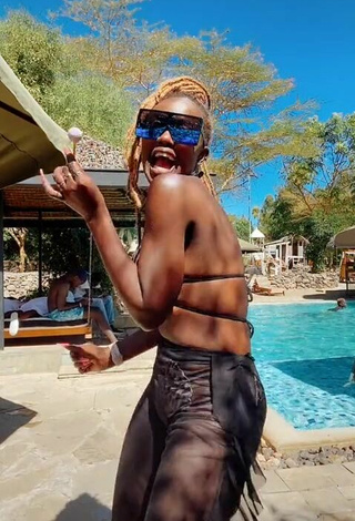 6. Hot Azziad Nasenya Shows Cleavage in Leopard Bikini Top