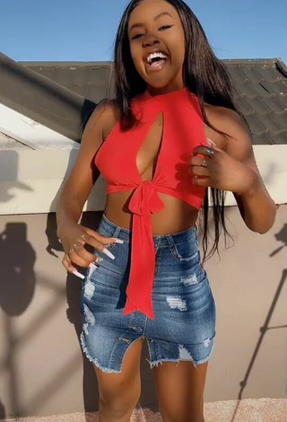 3. Sexy Azziad Nasenya Shows Cleavage in Orange Crop Top No  Bra
