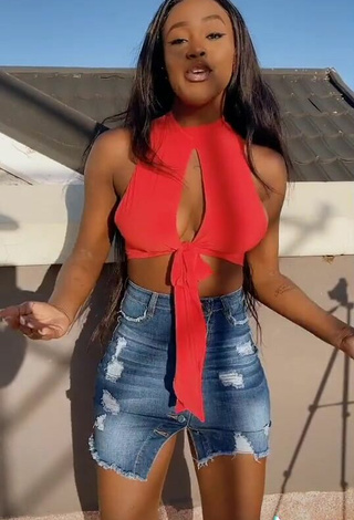 4. Sexy Azziad Nasenya Shows Cleavage in Orange Crop Top No  Bra