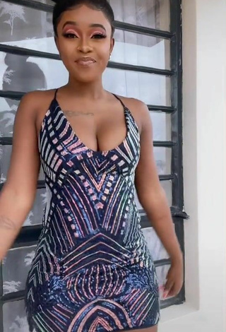 4. Sexy Azziad Nasenya Shows Cleavage in Dress