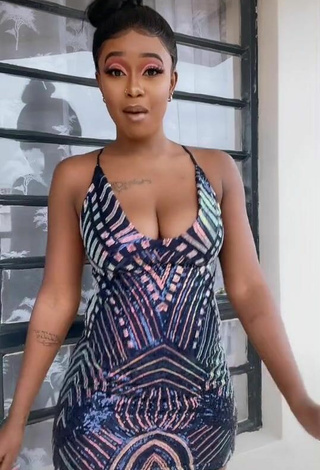 5. Sexy Azziad Nasenya Shows Cleavage in Dress
