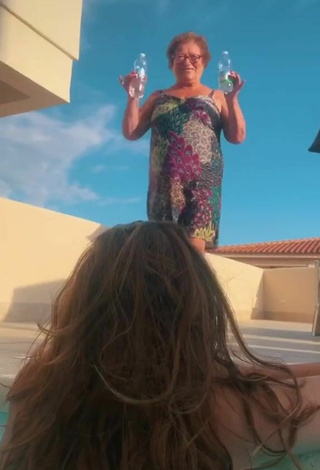 3. Sexy Giada Bosetti Shows Cleavage in Orange Bikini Top at the Pool