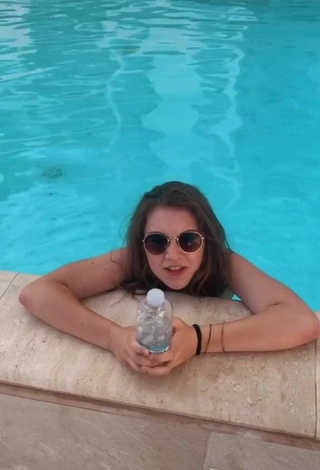 4. Sexy Giada Bosetti Shows Cleavage in Orange Bikini Top at the Pool
