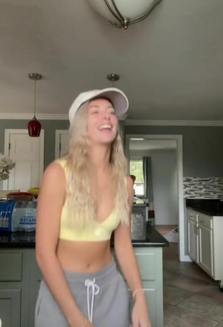6. Sexy Brianna LaPaglia Shows Cleavage in Yellow Crop Top