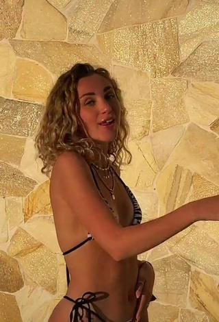 4. Erotic Carlotta Fiasella Garbarino Shows Cleavage in Zebra Bikini