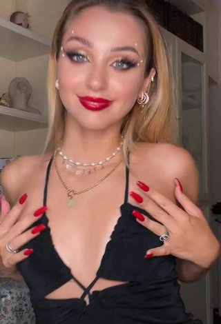 Sexy Carlotta Fiasella Garbarino Shows Cleavage in Black Dress without  Brassiere