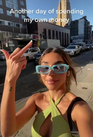 5. Sexy Chantel Jeffries Shows Cleavage in Lime Green Crop Top in a Street