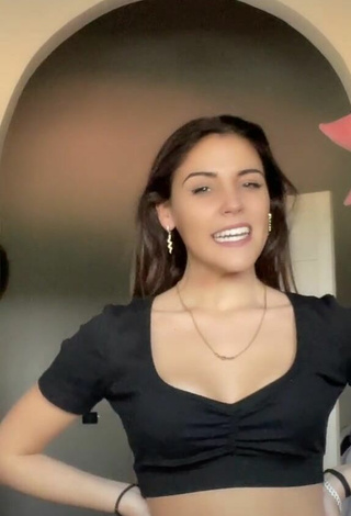 2. Amazing Clarissa Rotelli Shows Cleavage in Hot Black Crop Top