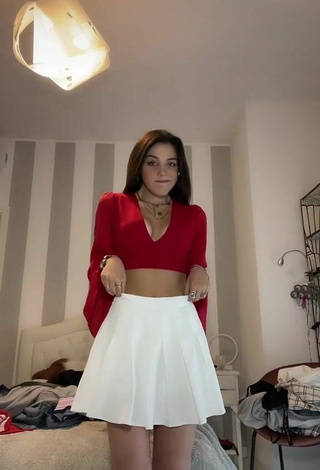 Beautiful Clarissa Rotelli Shows Cleavage in Sexy Red Crop Top