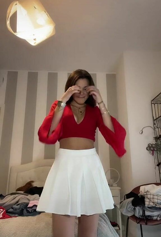 2. Beautiful Clarissa Rotelli Shows Cleavage in Sexy Red Crop Top