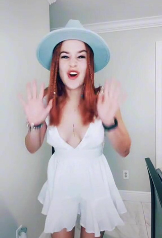 Sexy Estephani Shows Cleavage in White Dress Braless