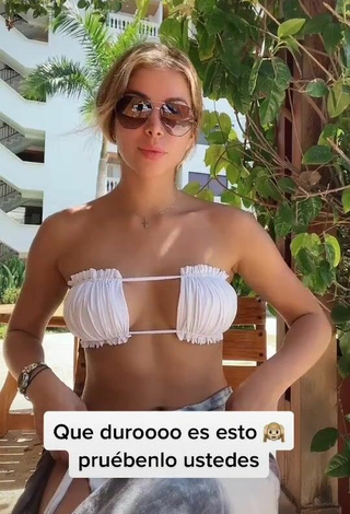 1. Hot Dahian Lorena Muñoz Quiñones Shows Cleavage in White Bikini Top