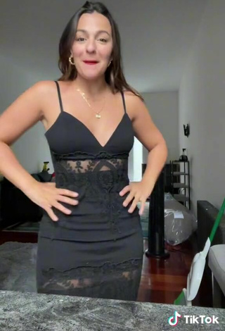 3. Sexy Deanna Giulietti Shows Cleavage in Black Dress