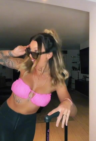 Sexy Aline Jost Shows Cleavage in Pink Bikini Top