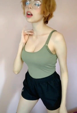 5. Alluring Didi Shows Cleavage in Erotic Olive Top