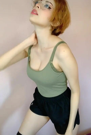 6. Alluring Didi Shows Cleavage in Erotic Olive Top