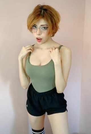 Seductive Didi Shows Cleavage in Olive Top