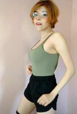 5. Seductive Didi Shows Cleavage in Olive Top