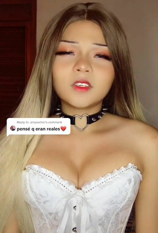 Sexy Dieu Snake Shows Cleavage in White Corset