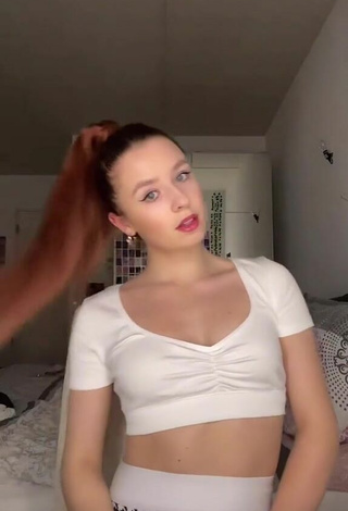 4. Sexy Doreen Shows Cleavage in White Crop Top