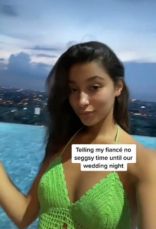 2. Sexy Kaory Desole Shows Cleavage in Green Crop Top