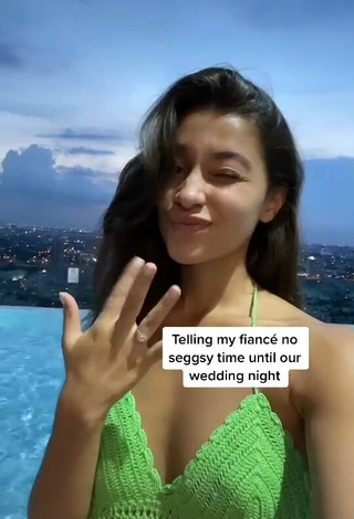 3. Sexy Kaory Desole Shows Cleavage in Green Crop Top