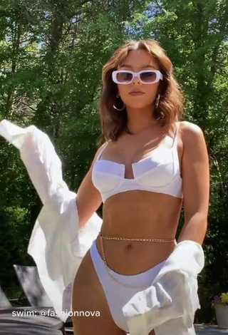 Hot Eliza Minor Shows Cleavage in White Bikini